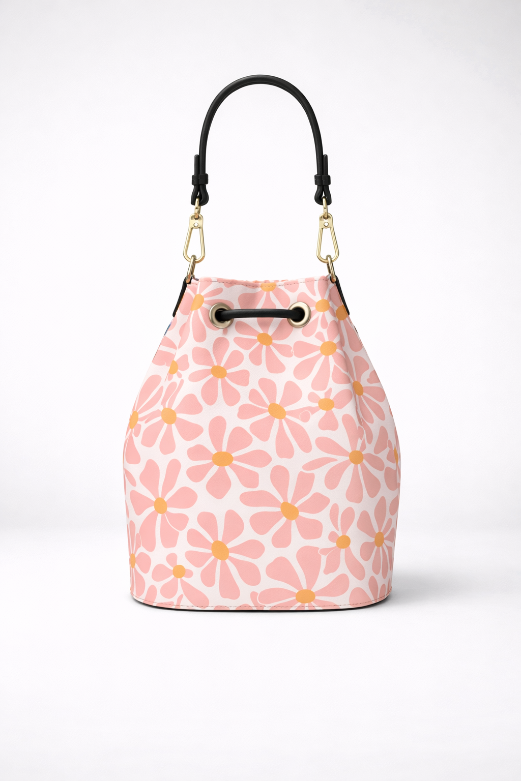 Pink floral-patterned handbag with black handle on a white background