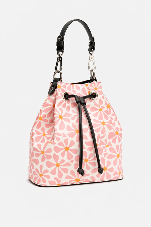Pink floral-patterned bucket bag with black drawstring on a white background